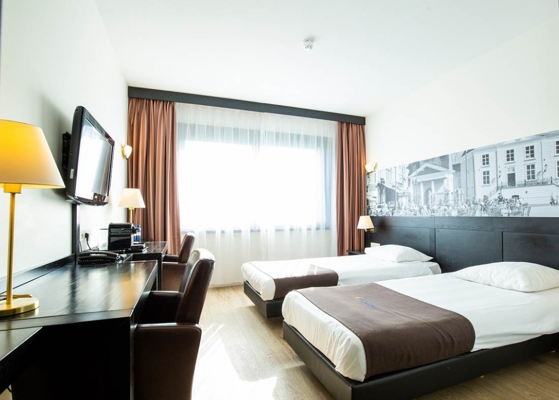 Deluxe kamer in Bastion Hotel Roosendaal, met twee eenpersoonsbedden